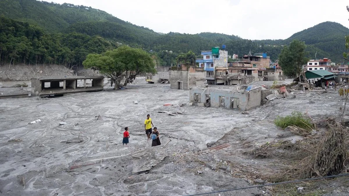 Australian aid boosted as Nepal flood rescue continues