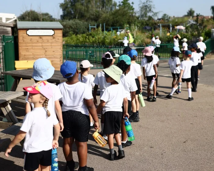 Retrofit schools and consider moving exams to beat extreme heat, says teaching union leader