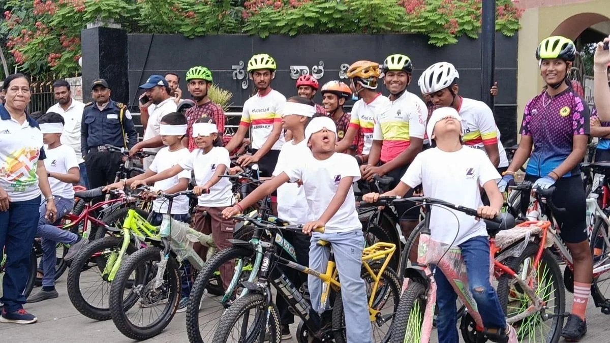 Children ride bicycles blindfolded in Vijayapura