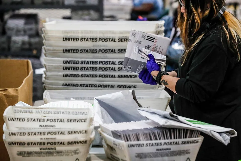 Controversial New USPS Mail-In Ballot Rule Can Take Effect—For Now—Judge Rules