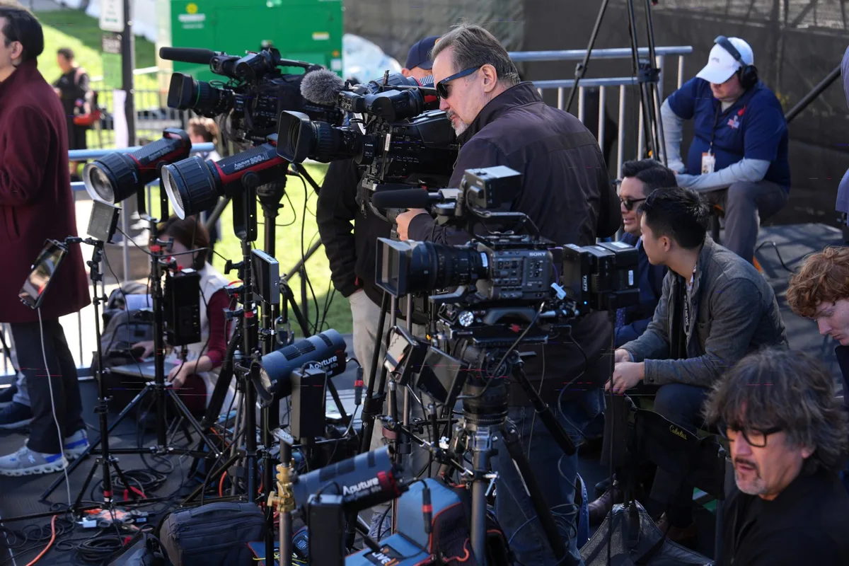 DOJ is investigating news organizations for antitrust violations after the White House TV pool halted coverage when Trump banned several outlets
