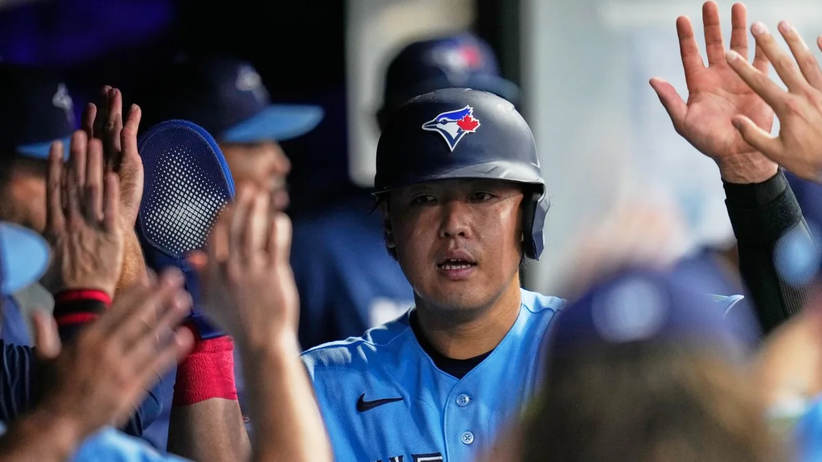 Missed throw and wild pitch help Okamoto score for Blue Jays