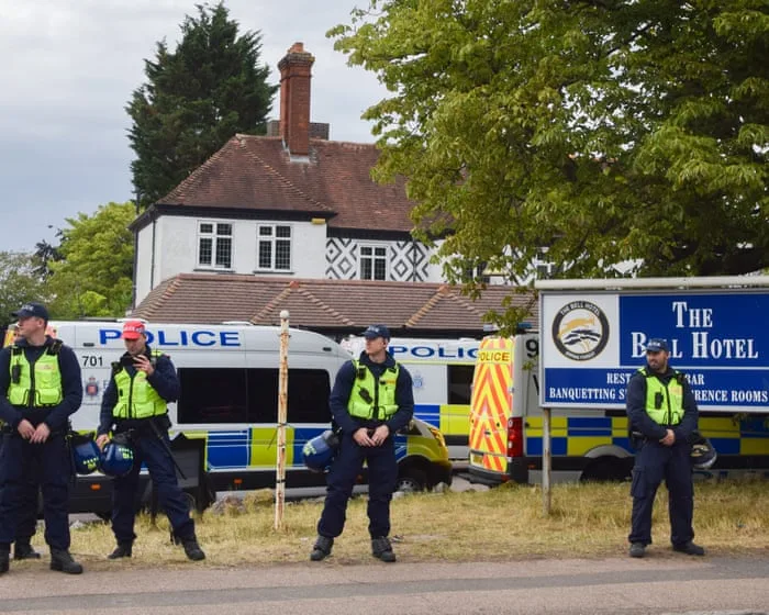 Number of asylum seekers living in hotels across UK halves in a year