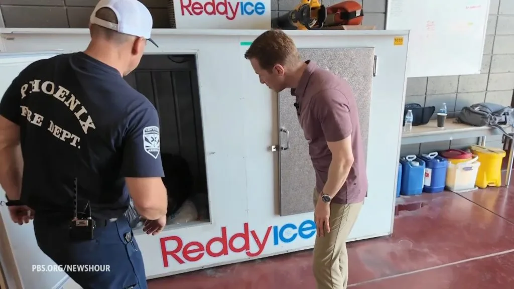 In one of the nation's hottest cities, bags of ice are helping save lives