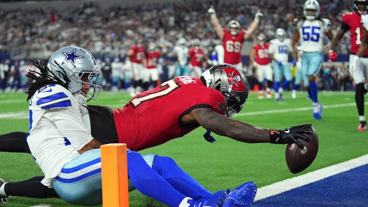 Bucs beat sloppy Cowboys for first win of NFL season