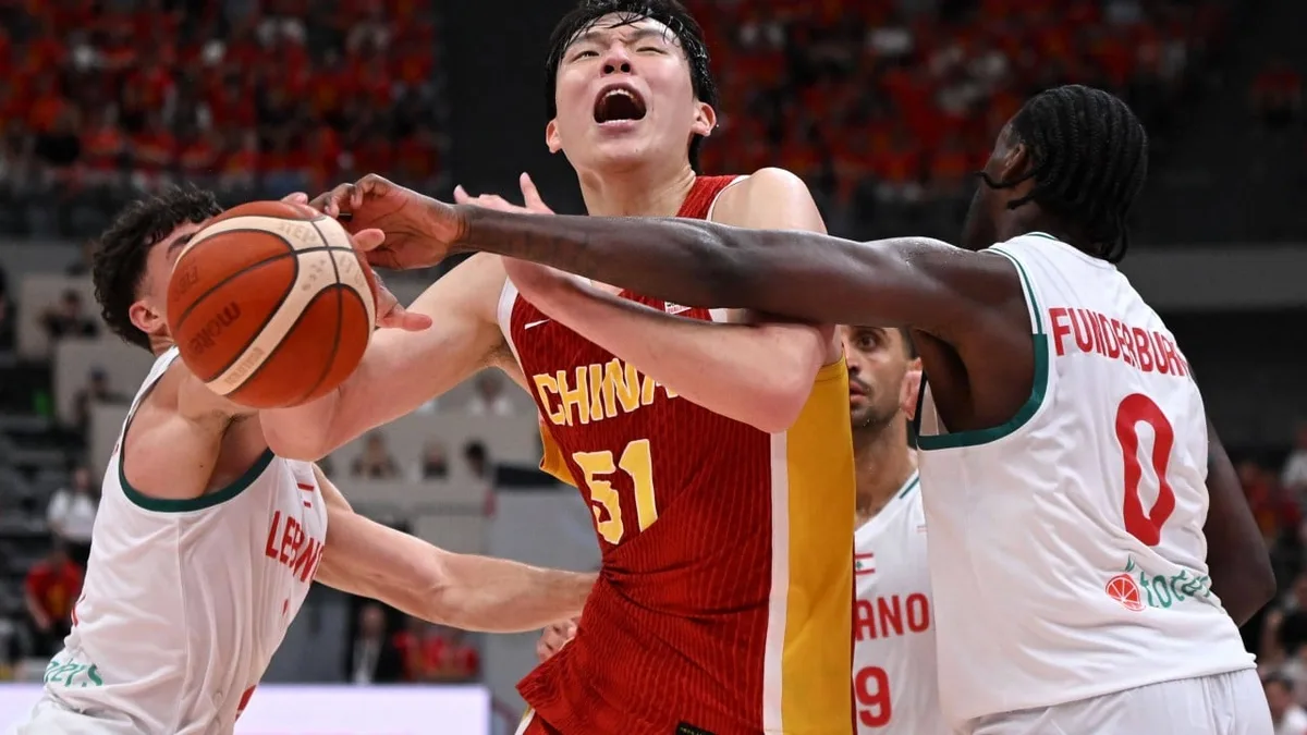 Teen spectator in VIP seat hauled out of arena after hurling basketball at China players