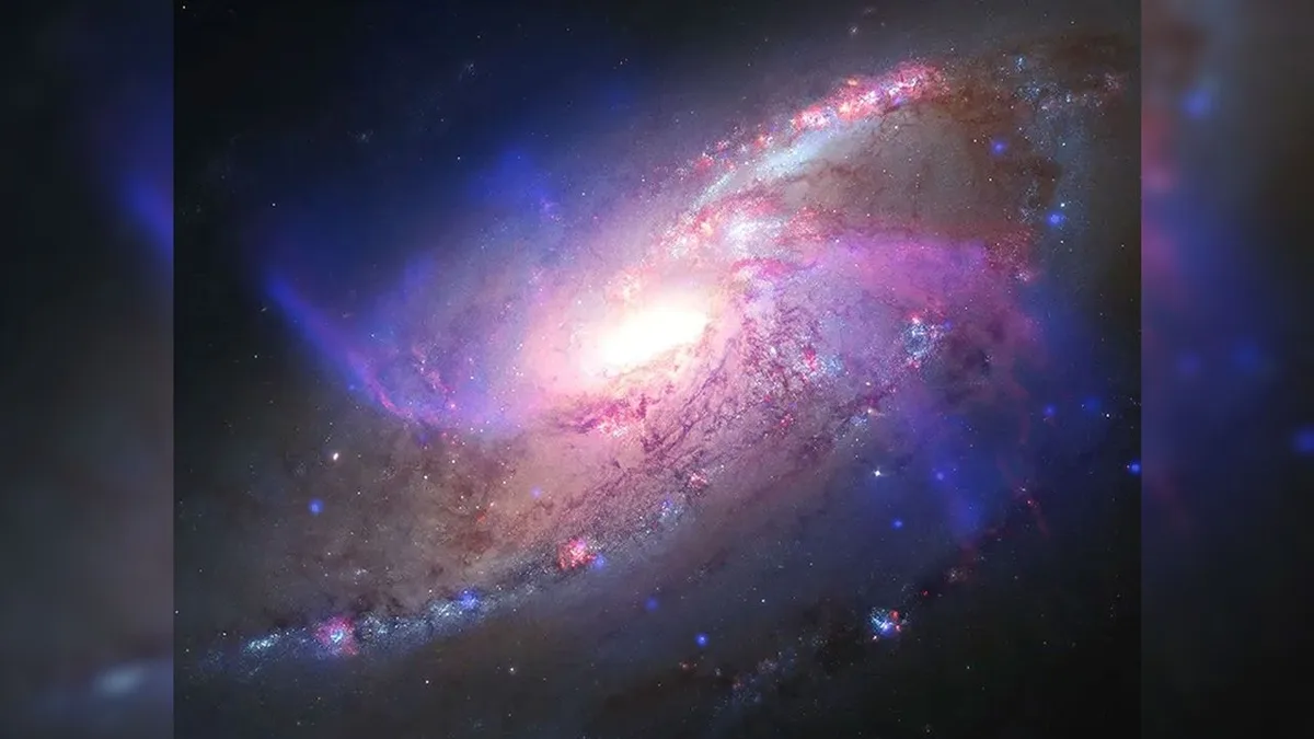 Glowing galaxy with anomalous extra arms | Space photo of the day for Aug. 27, 2026