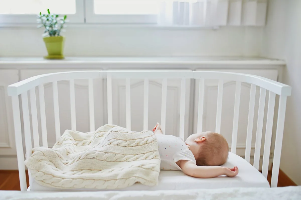Coroner calls for baby monitor change after child died because volume was turned down