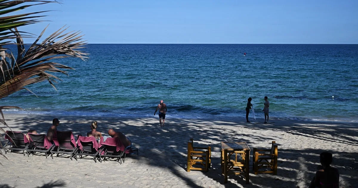 Father and young sons rescued after 16 hours stranded off Thai island