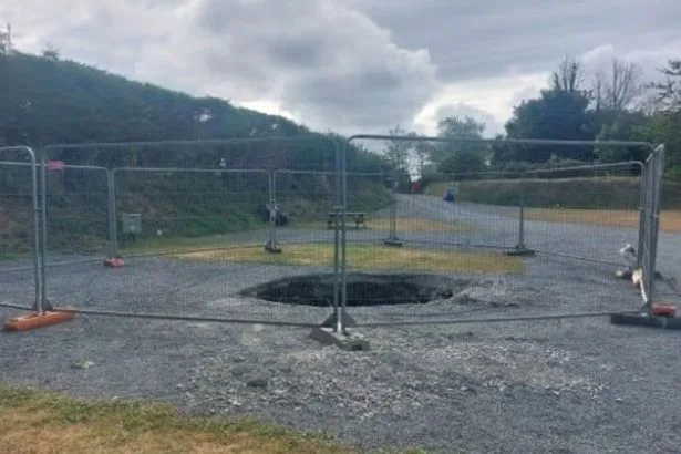 Tourist thought 'you're gone' as he fell down 30ft sinkhole that left his BMW teetering above him