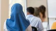 Austria's Islamic headscarf ban in force as under-14s go back to school