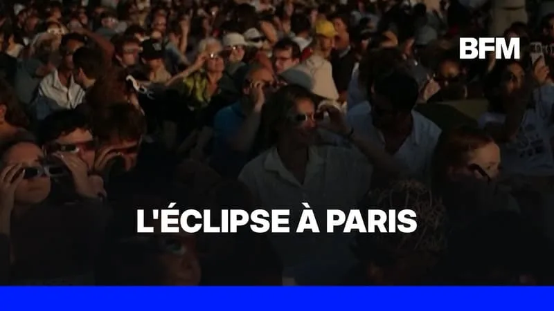 Éclipse solaire: la foule réunie à Paris observe l’éclipse à son maximum