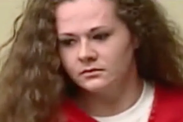 Christa Pike has handcuffs removed but remains shackled after surviving execution