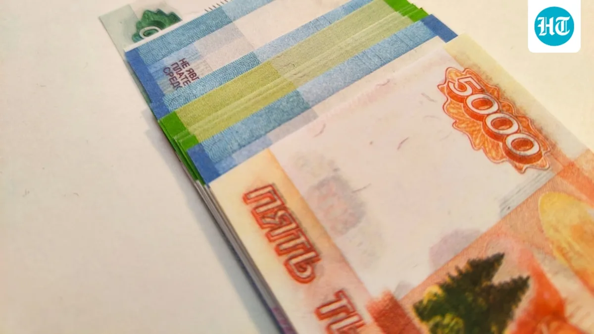 Why is Russia deliberately weakening its currency?