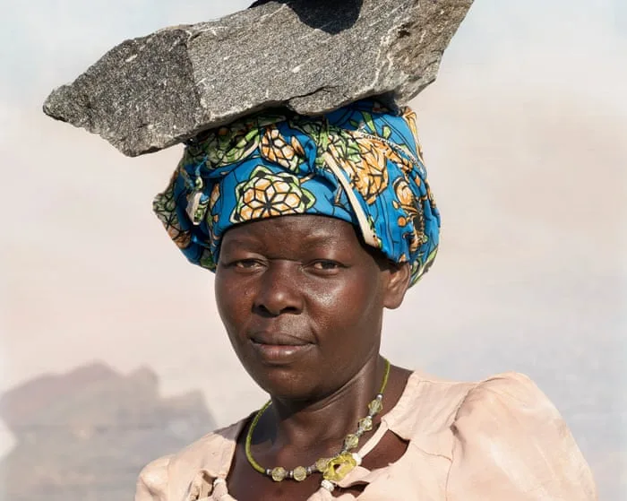 A Ugandan quarry worker carrying rocks on her head: Dan Nelken’s best photograph