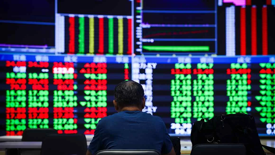 AI optimism lifts Asian stocks after Nasdaq ends at record high