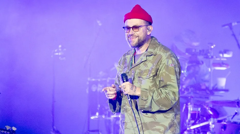 Gorillaz frontman Damon Albarn holds up Palestinian flag during show after Macklemore tour removal