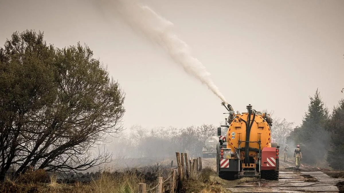 Firefighters battle massive fires in Belgium and Greece