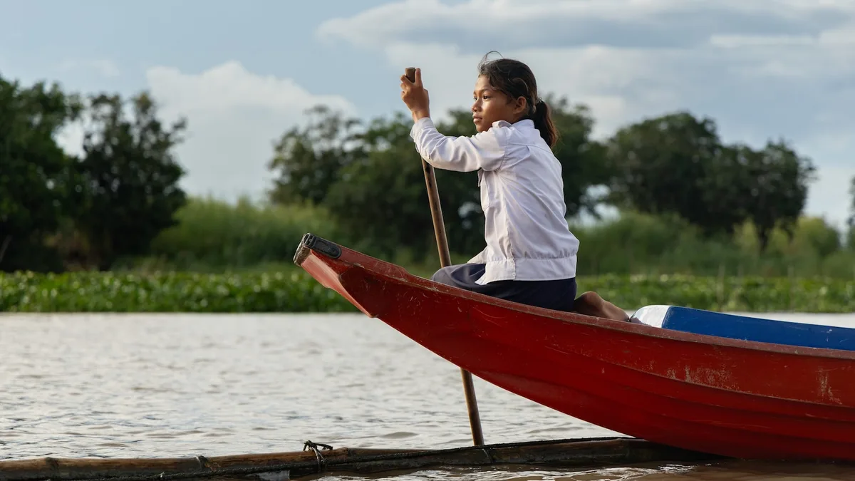 Photos show Cambodian children attend school in floating villages along the Tonle Sap lake.