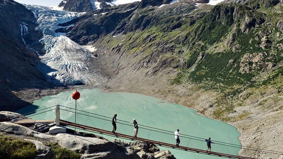 Melting Swiss glacier reveals remains of two Belgian mountaineers missing since 1992