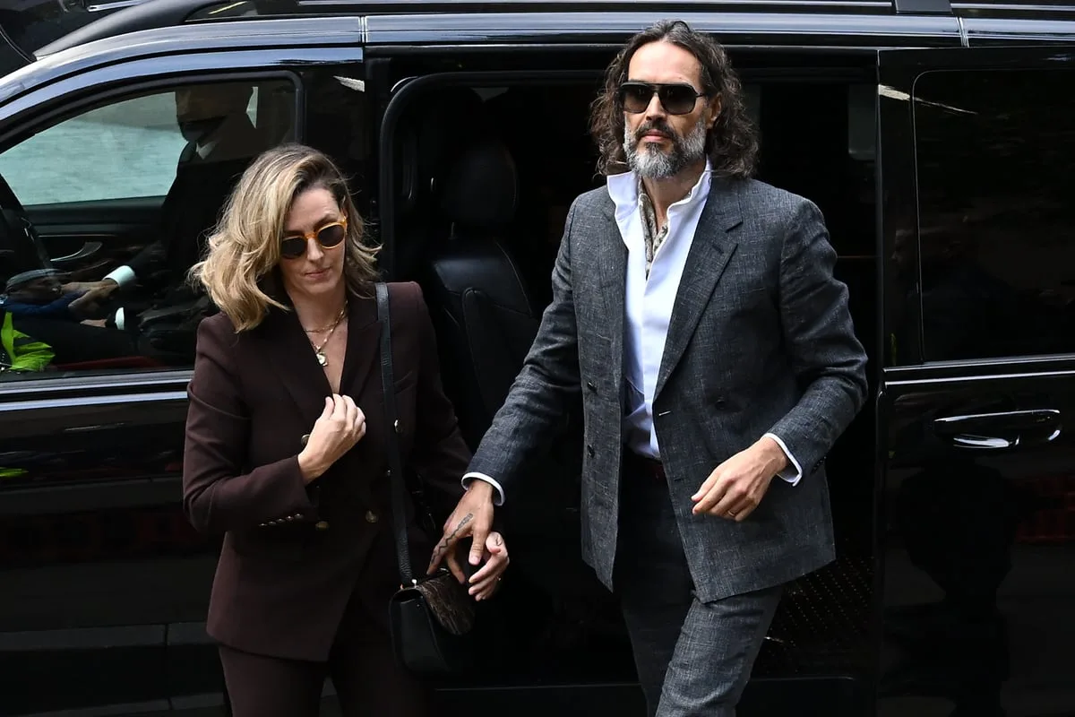 Who is Laura Gallacher? Russell Brand’s wife sticks by comedian as rape trial begins