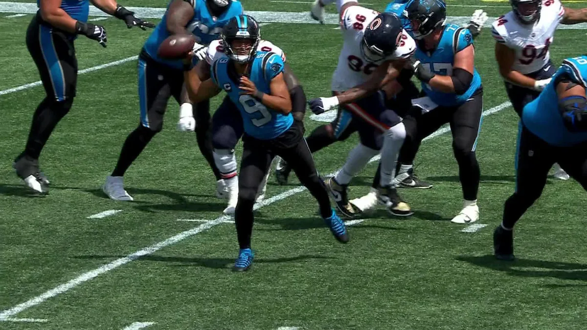 Panthers’ Young dances in pocket before finding wide-open Hubbard for TD