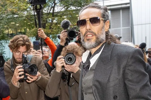 Russell Brand arrives for the second day of his rape and sex assault trial