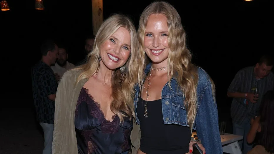Christie Brinkley and Sailor Brinkley Cook twin in denim at John Mayer's show in New York