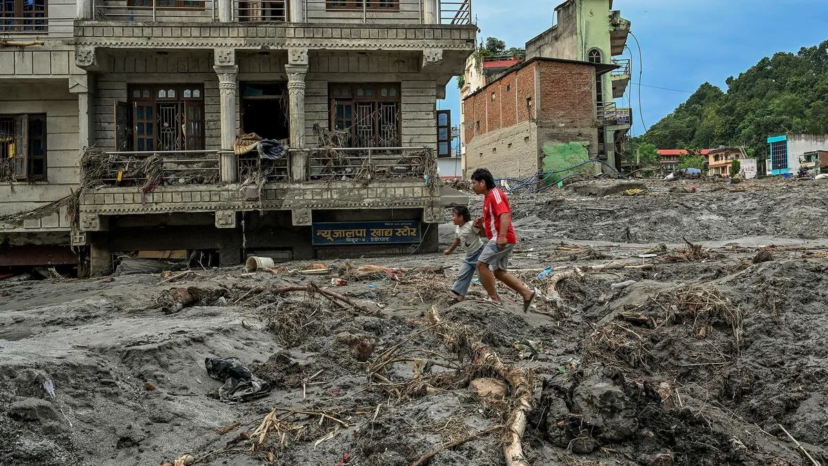 Nepal floods leave 500 workers trapped in tunnels as 43 Australians remain missing amid China disaster