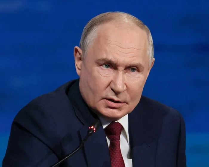 ‘The choice was prison or exile’: journalists who fled Russia publish grim portrait of Putin