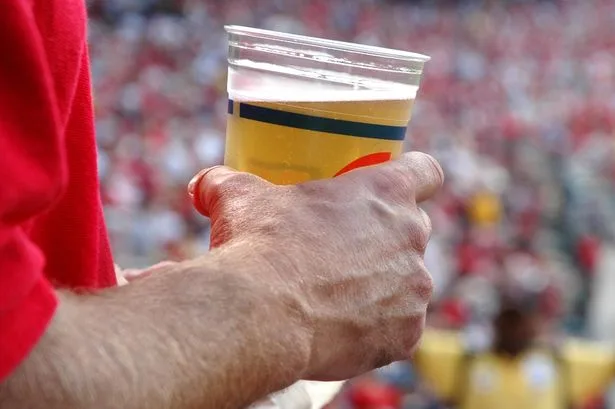 Mirror readers debate whether government should lift ban on football fans drinking in the stands