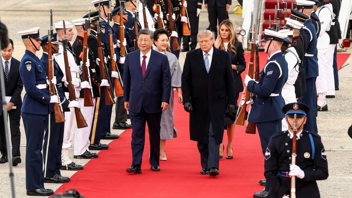 Trump welcomes Xi Jinping with planeside ceremony on arrival for three-day U.S. visit