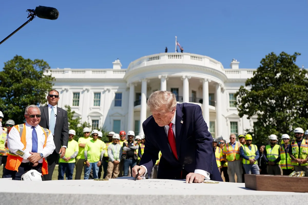 Trump shows off his new helipad, brags about construction projects