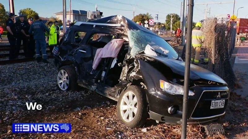 Driver’s brush with death after car drives onto train tracks
