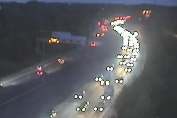 M60 traffic - live: 'Police incident' leaves motorway closed in both directions