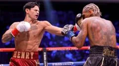 Garcia crushes overmatched Benn in two rounds
