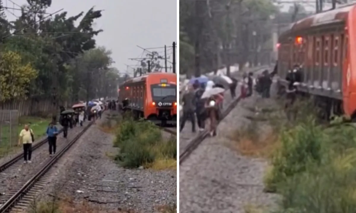 Passageiros caminham pelos trilhos após falha na rede elétrica da Linha 12-Safira, da CPTM