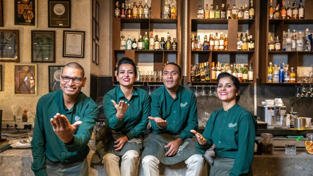 Man's restaurant chain employs hundreds of hearing-impaired, spreads joy
