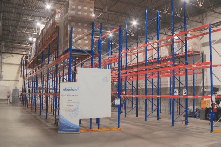 Bare shelves at Alberta food banks as demand soar: ‘Very difficult year’