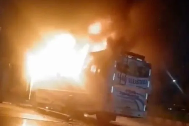 At least 9 dead after fire rips through moving bus and terrified passengers jump from windows