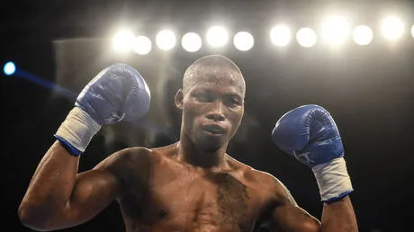Two arrested over murder of boxing star