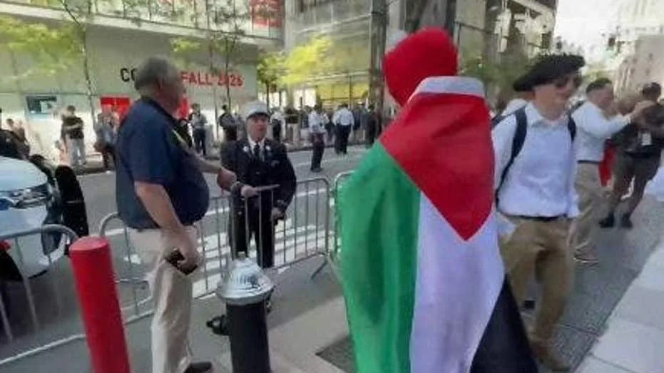 NYC firefighter caught on camera ripping pro-Palestinian agitator in Elmo costume near Ground Zero on 9/11