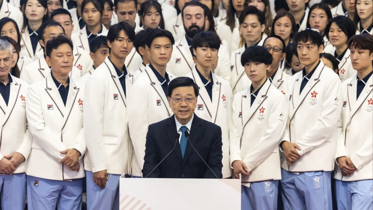 City leader Lee hands Hong Kong flag to Asian Games athletes, hails ‘never-say-die spirit’