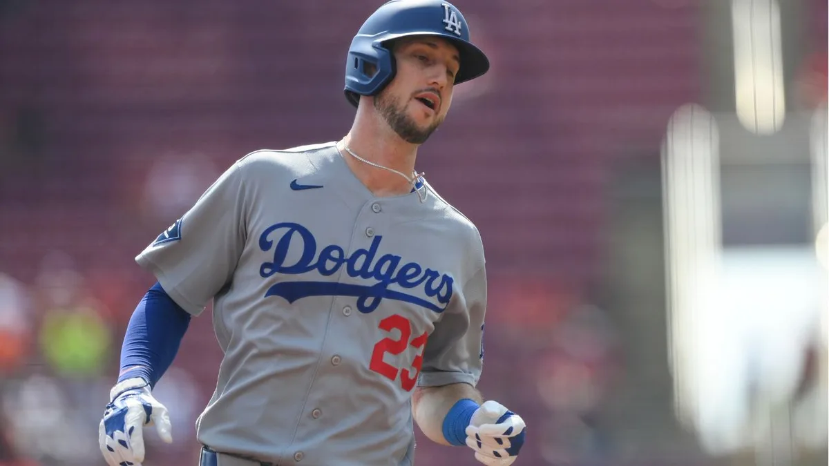 Dodgers clinch fifth straight NL West title, Tucker has four hits win over Reds