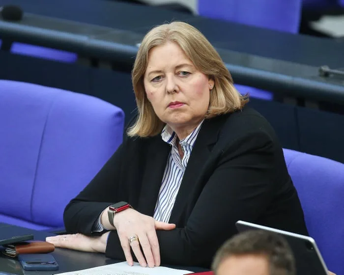 German minister quits after death of stepdaughter and political attacks