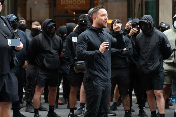 Police update after far-right leader Danny Tommo 'seen slashing inflatable dinghy in Channel'
