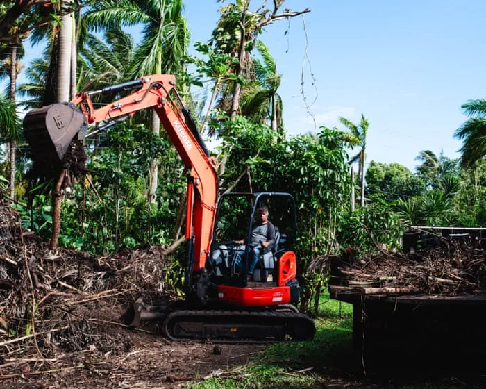 After the strongest storm in a generation, Hawai’i residents take recovery into their own hands – in pictures