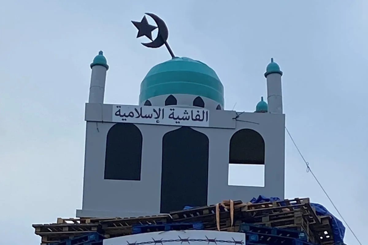 Three men appear in court in connection with mosque model on loyalist bonfire