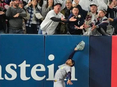 Fan interference denies Anthony Volpe a tying homer as Yankees get swept by Rays in ALDS