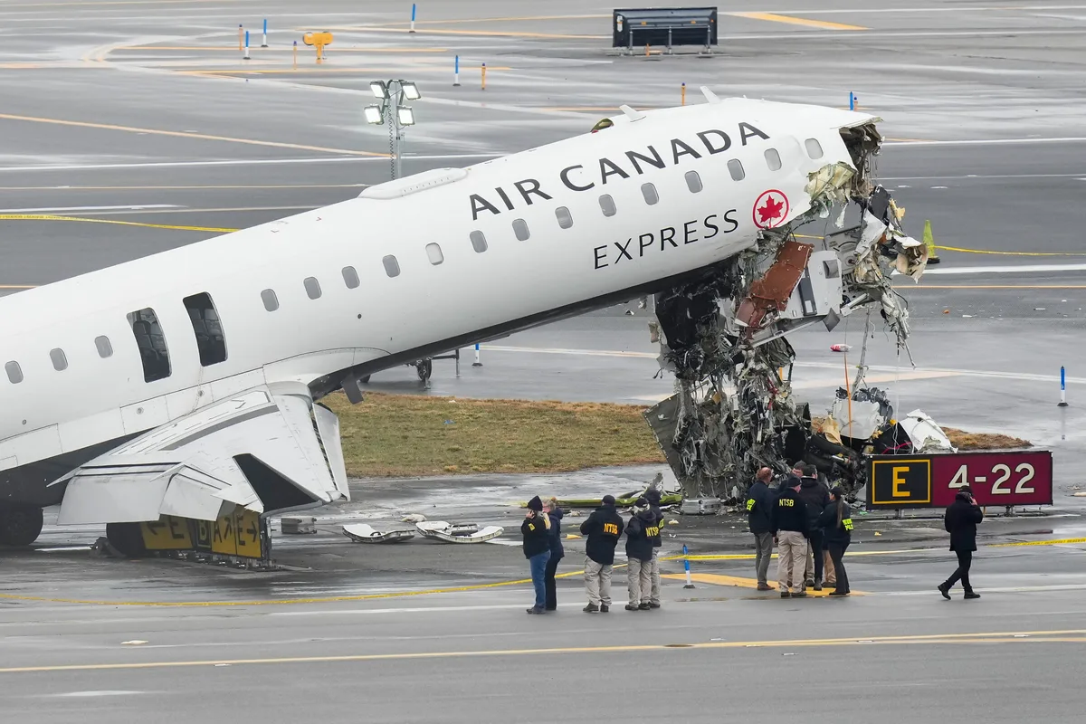 U.S. FAA moves to fire two air-traffic controllers who left work early before fatal Air Canada crash at LaGuardia, source says